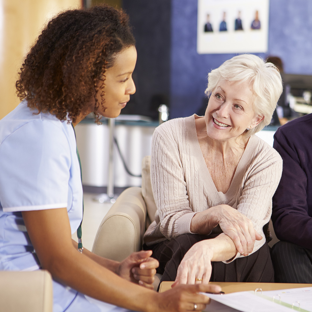 Nurse and woman speaking