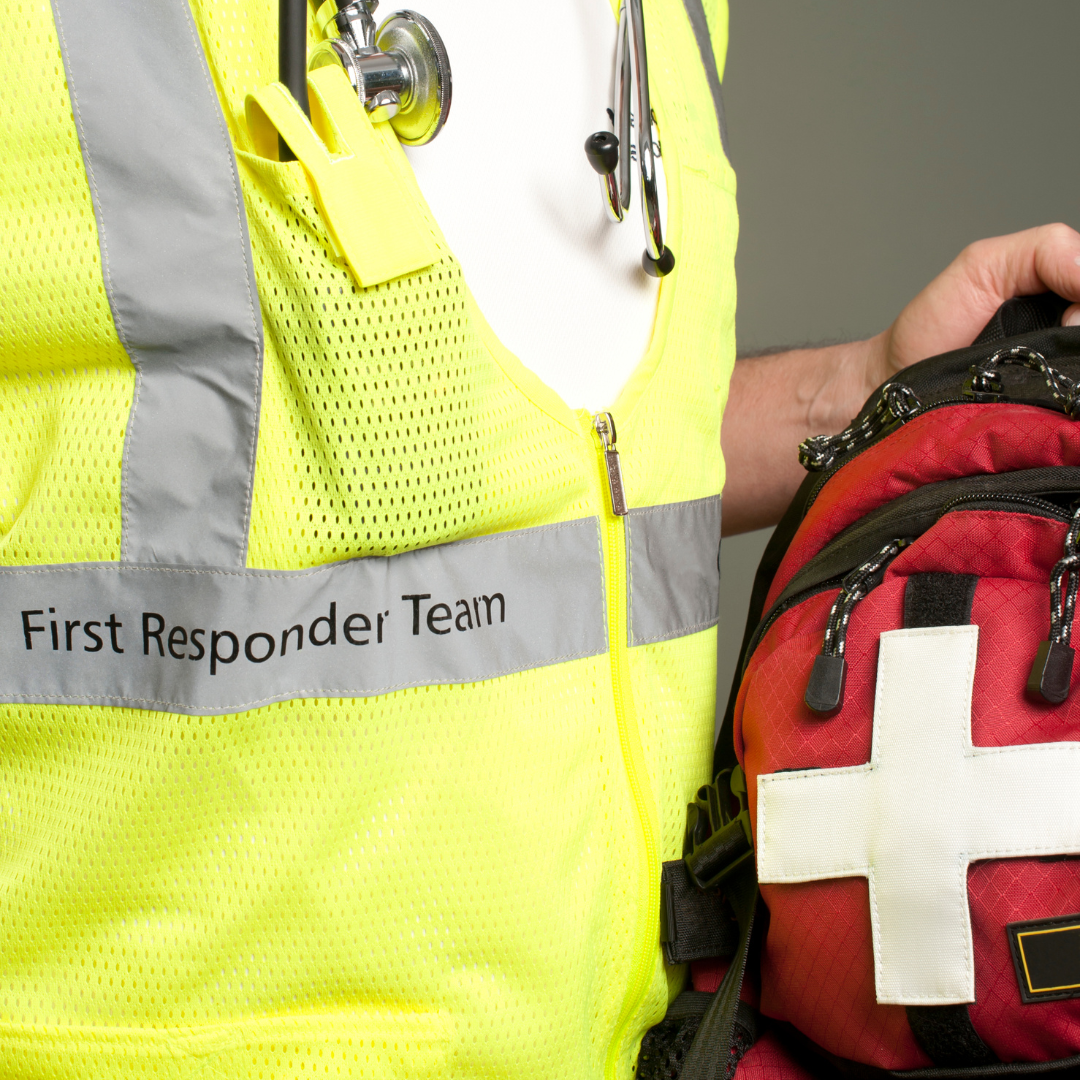 first responder holding a medical bag